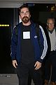christian bale lands at lax airport 01