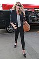 kate upton jets out of town after lacma rain 02