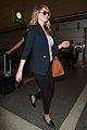 kate upton jets out of town after lacma rain 04