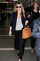 kate upton jets out of town after lacma rain 07