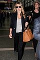 kate upton jets out of town after lacma rain 09
