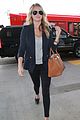 kate upton jets out of town after lacma rain 24