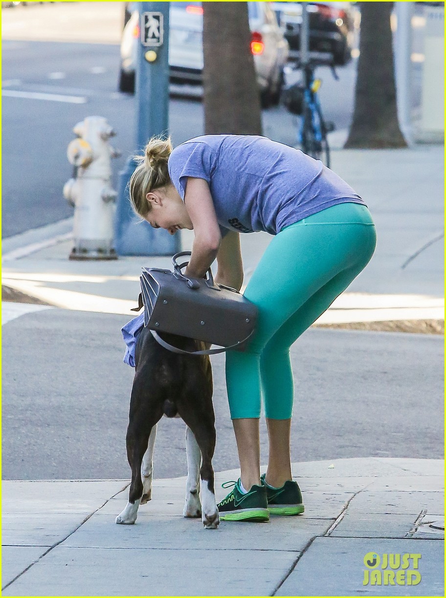 kate upton goes for a walk with pup harley 183536231