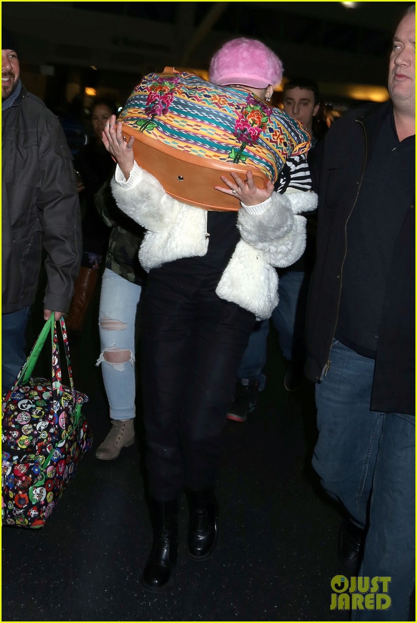 miley cyrus wears ring at airport 183554950