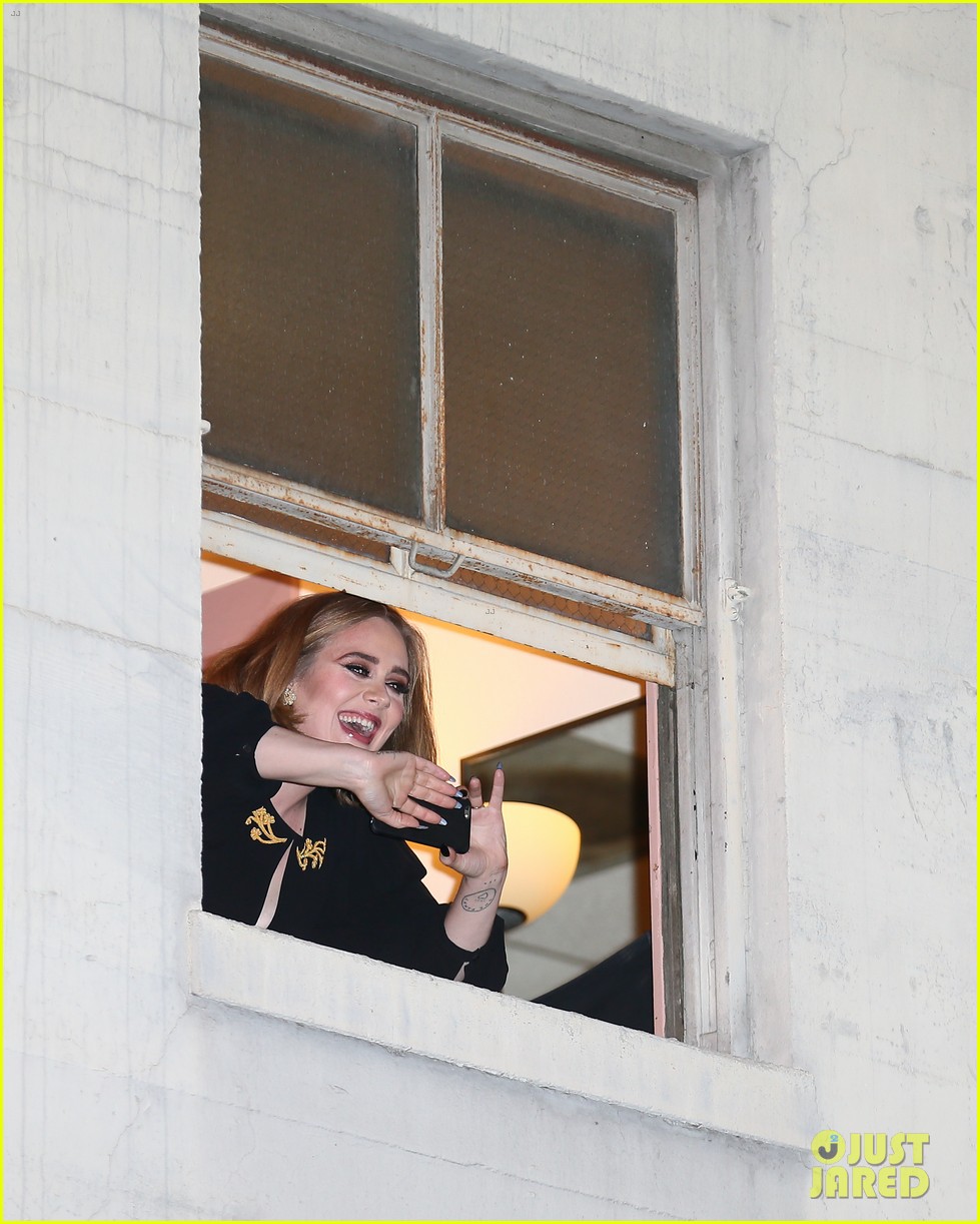 adele pops out of her window at wiltern show 303576708