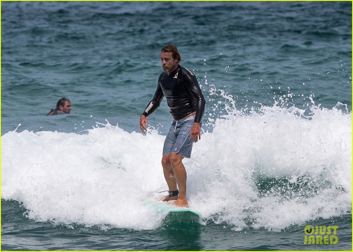 simon baker goes scruffy while catching waves in sydney 08
