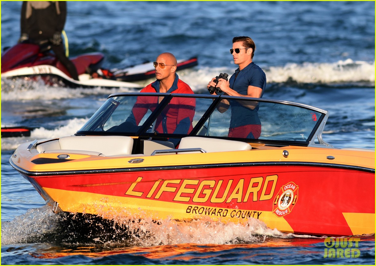 zac efron is having difficulty with swimming in the ocean 083588973