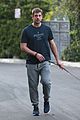 aaron rodgers takes girlfriend olivia munns dog for a walk 01