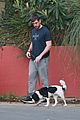 aaron rodgers takes girlfriend olivia munns dog for a walk 03