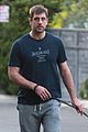 aaron rodgers takes girlfriend olivia munns dog for a walk 04