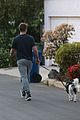 aaron rodgers takes girlfriend olivia munns dog for a walk 19