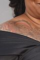 whoopi goldberg shows off massive tattoo at oscars 03