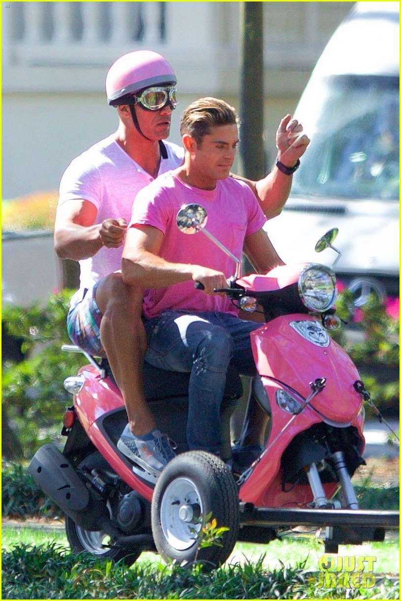 zac efron the rock film baywatch on a scooter 693612586