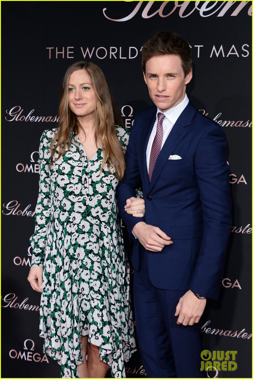 eddie redmayne suits up for omega event with wife hannah 283595484
