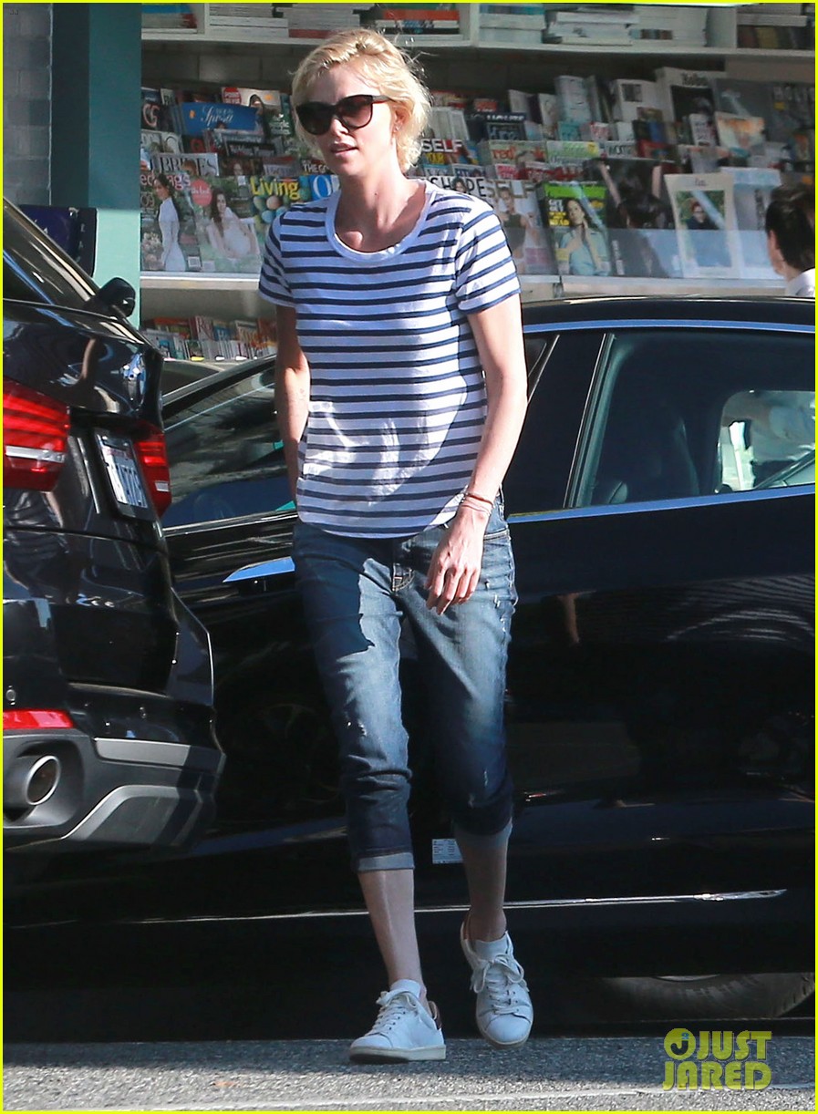 charlize theron steps out in after glam oscars 073594514