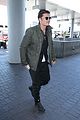 orlando bloom pulls off cool airport style for trip to paris 03
