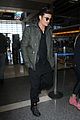 orlando bloom pulls off cool airport style for trip to paris 05