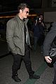 orlando bloom pulls off cool airport style for trip to paris 06