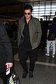 orlando bloom pulls off cool airport style for trip to paris 08