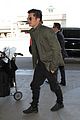 orlando bloom pulls off cool airport style for trip to paris 09