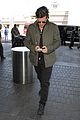 orlando bloom pulls off cool airport style for trip to paris 12