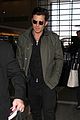 orlando bloom pulls off cool airport style for trip to paris 16