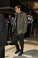 orlando bloom pulls off cool airport style for trip to paris 19