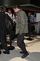 orlando bloom pulls off cool airport style for trip to paris 20