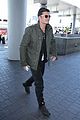 orlando bloom pulls off cool airport style for trip to paris 21