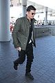 orlando bloom pulls off cool airport style for trip to paris 22