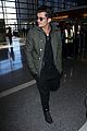 orlando bloom pulls off cool airport style for trip to paris 23