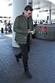 orlando bloom pulls off cool airport style for trip to paris 24