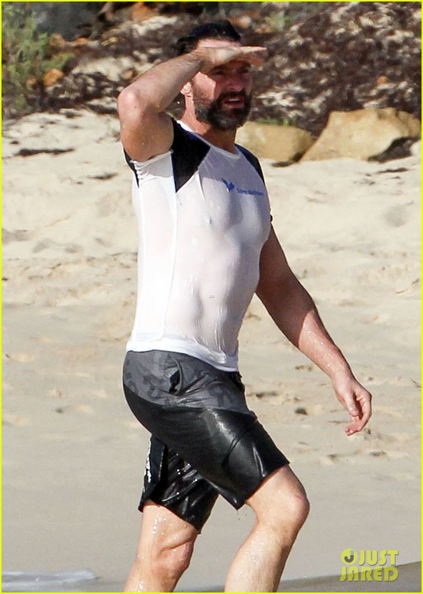 hugh jackman abs poke out of his wet shirt 07