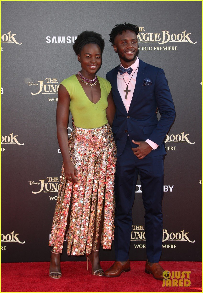 lupita nyongo brings brother peter to jungle book premeire 01