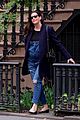 pregnant liv tyler accentuates baby bump in overalls 08
