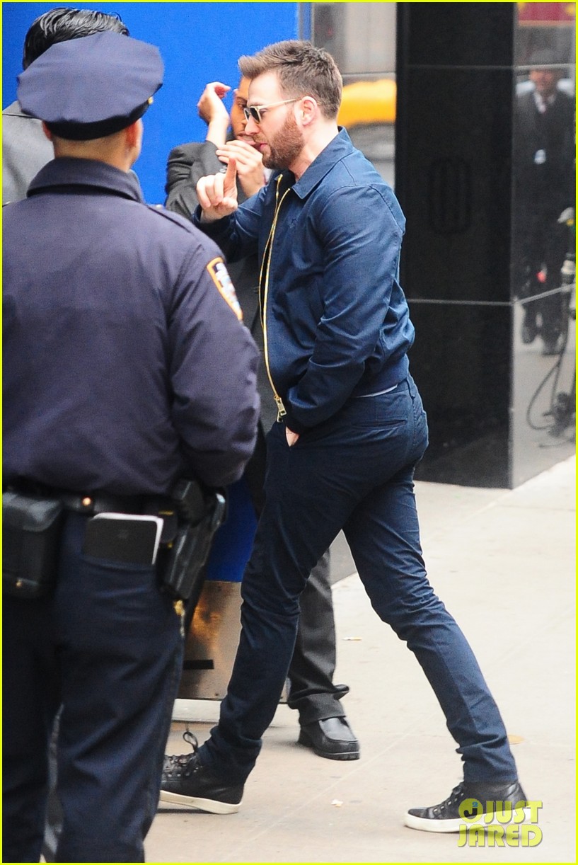 Robert Downey, Jr. Nursed Chris Evans' 'Captain America' Injury! Photo