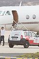 brad pitt waves goodbye before hopping on a private plane 06