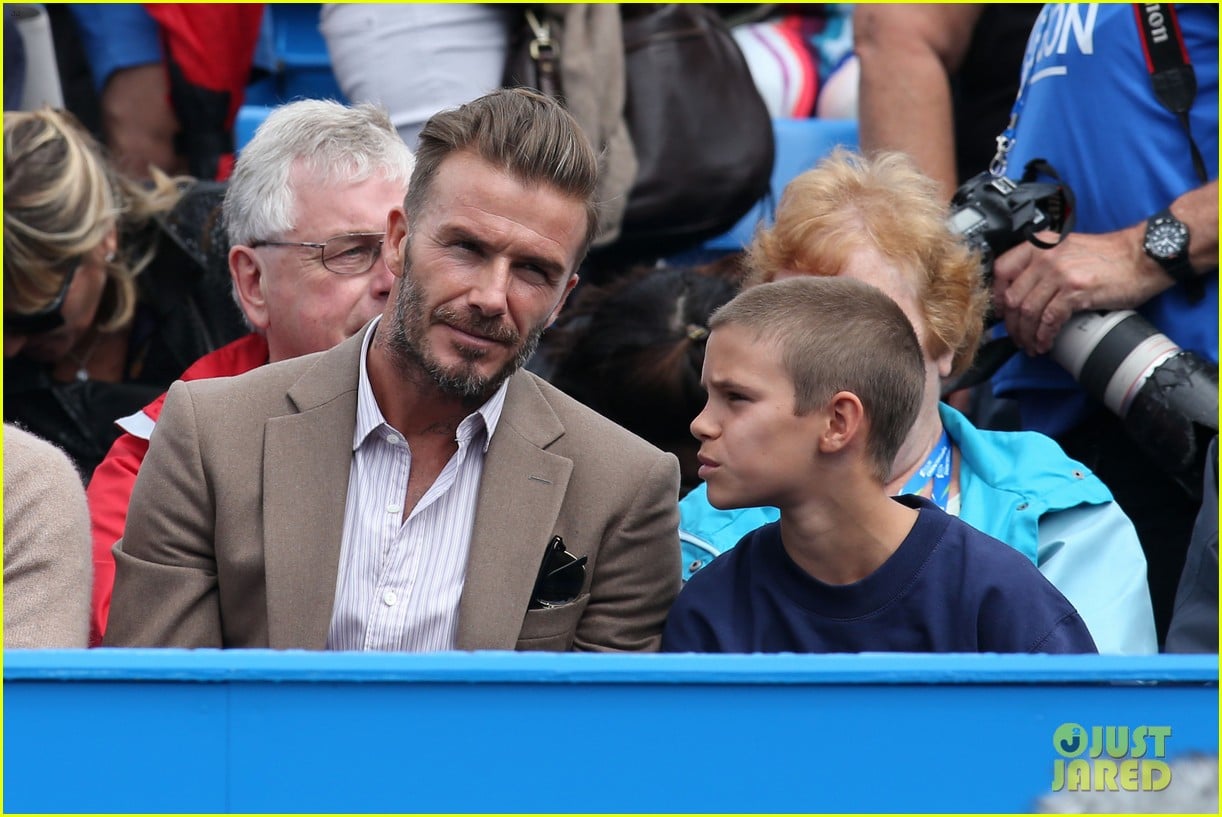 david beckham takes in a tennis match with son romeo 083682131