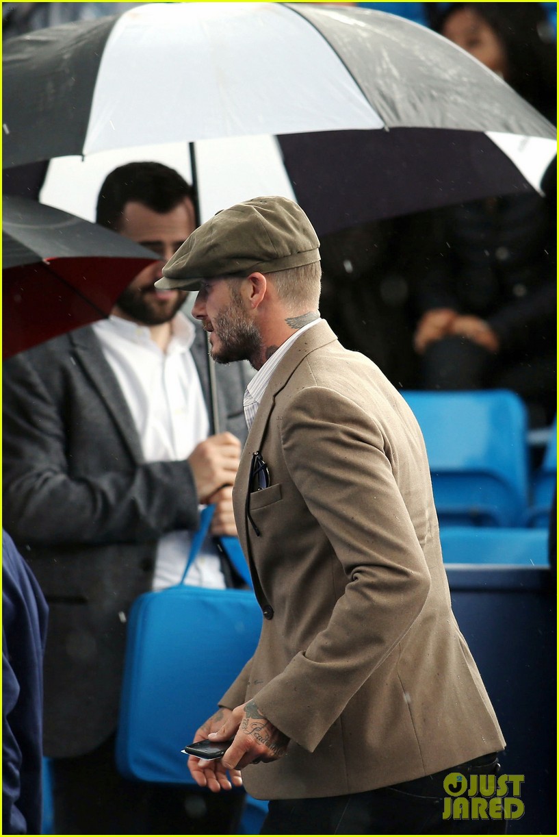 david beckham takes in a tennis match with son romeo 123682135