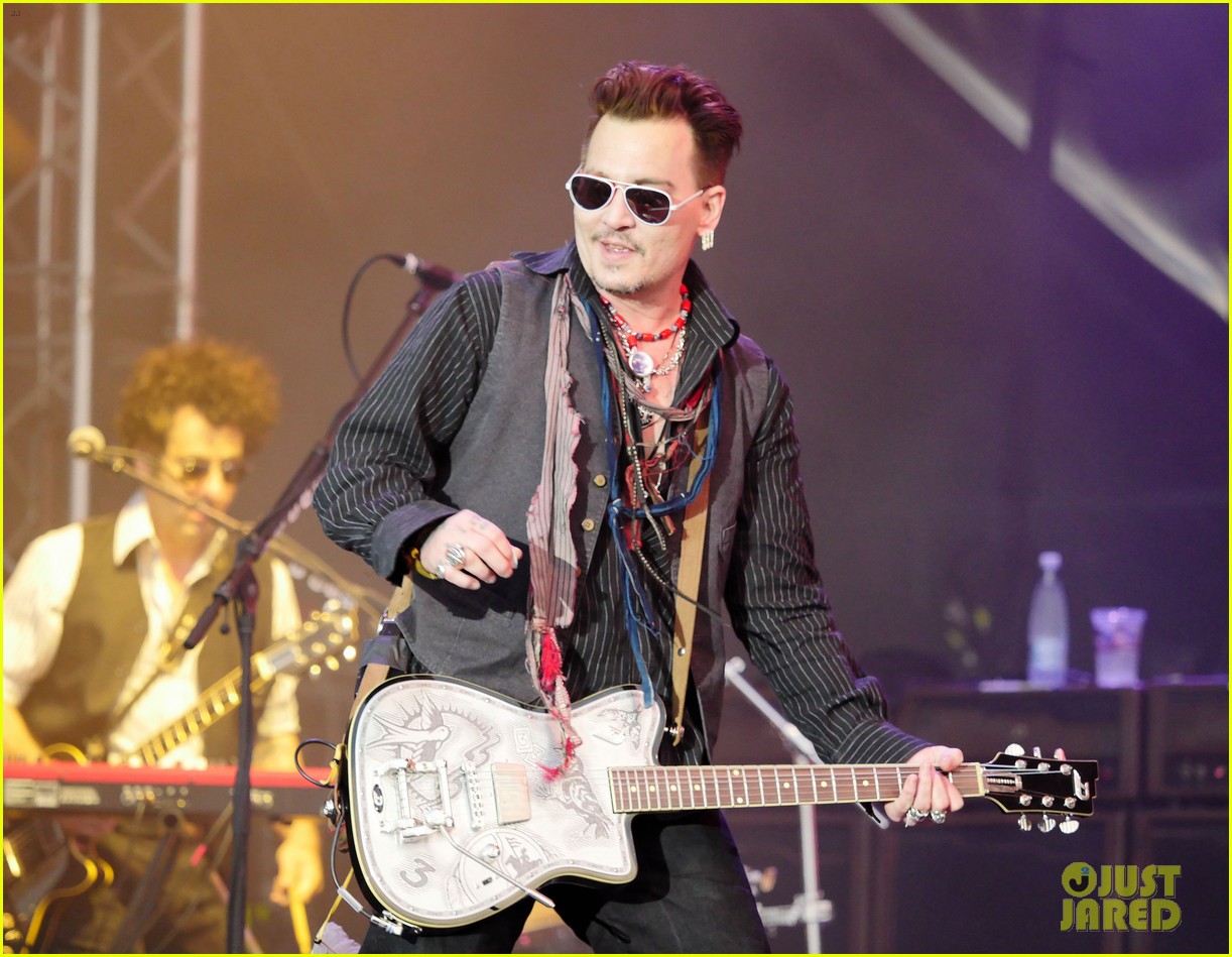 Johnny Depp Performs in Denmark After Alleged Texts Emerge Referencing