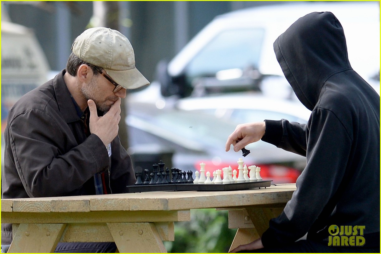 rami malek & chrisrtian slater play chess while filming mr robot 183682677