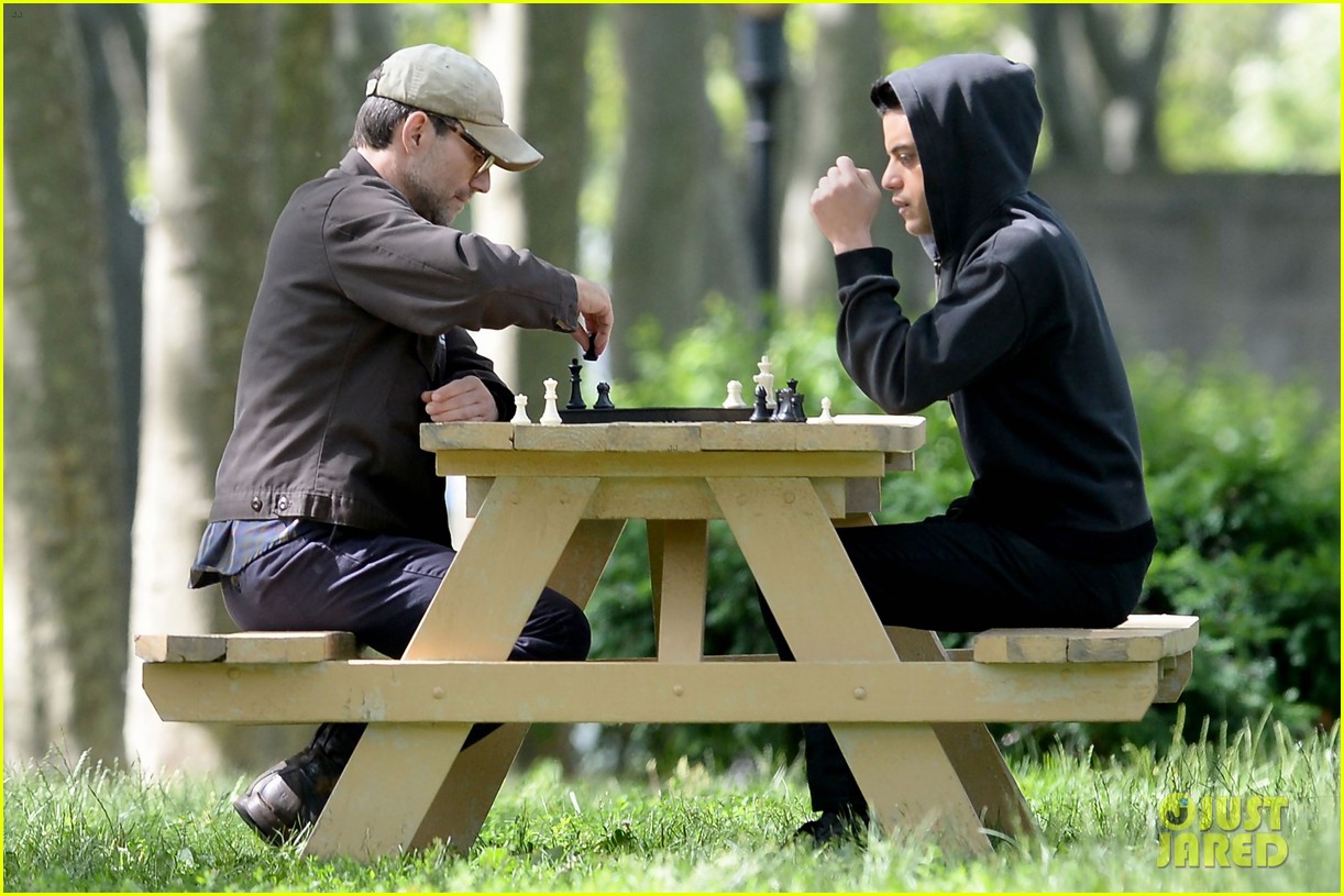 rami malek & chrisrtian slater play chess while filming mr robot 203682679