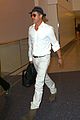 brad pitt wears all white for his lax arrival 01
