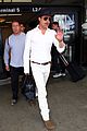 brad pitt wears all white for his lax arrival 02