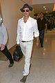 brad pitt wears all white for his lax arrival 03