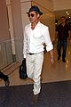 brad pitt wears all white for his lax arrival 04
