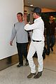 brad pitt wears all white for his lax arrival 05