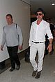 brad pitt wears all white for his lax arrival 07