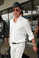 brad pitt wears all white for his lax arrival 08