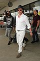 brad pitt wears all white for his lax arrival 09